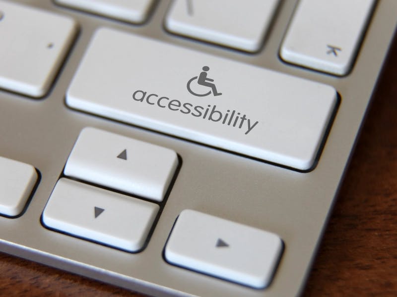 Decorative image of accessibility icon on keyboard key